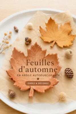 Des feuilles d'automne colorées en pâte à modeler sur une table en bois